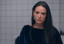 Escena de la película galardonada “La sustancia” con etalonaje realizado en DaVinci Resolve Studio por Lux Studios, destacando la intensidad emocional de la protagonista en un entorno cromático controlado.