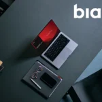 Portátil con la pantalla de inicio de Biamp VenueTune sobre una mesa de trabajo