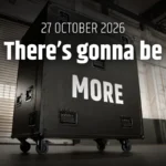 Flight case negro con ruedas y la palabra MORE impresa en una nave industrial, junto al texto «27 October 2026. There’s gonna be», en la imagen de la campaña de LD Systems